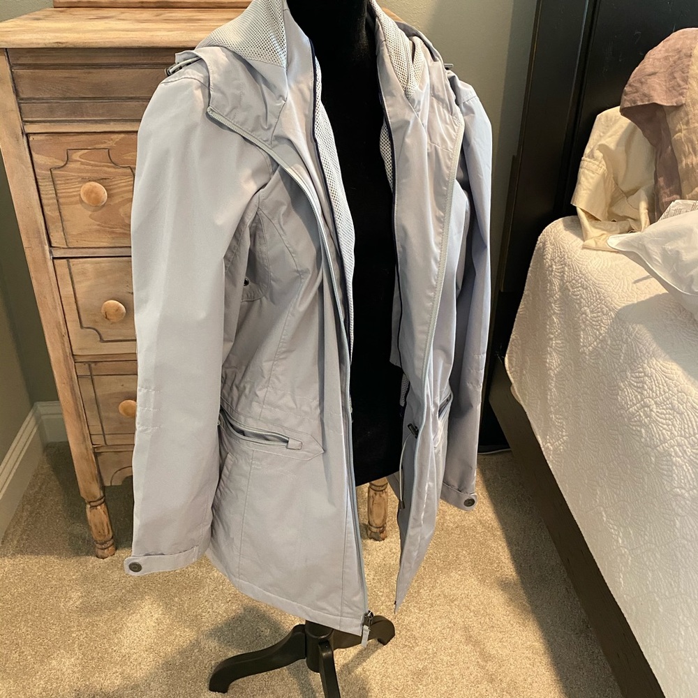 Women’s Natural Reflections brand rain coat, size large
